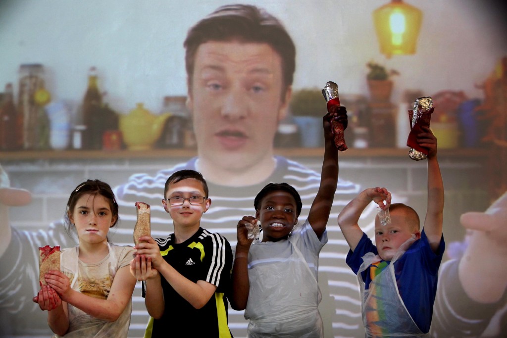 Pupils at Byker Primary School take part in the 'Jamie Oliver's Food Revolution Day' with the help of 'Food Nation' (based in Byker).....pupils with their 'Rainbow Wraps'.........(pic Dave Charlton)