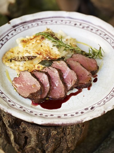 Pan-roasted venison with creamy baked potato & celeriac